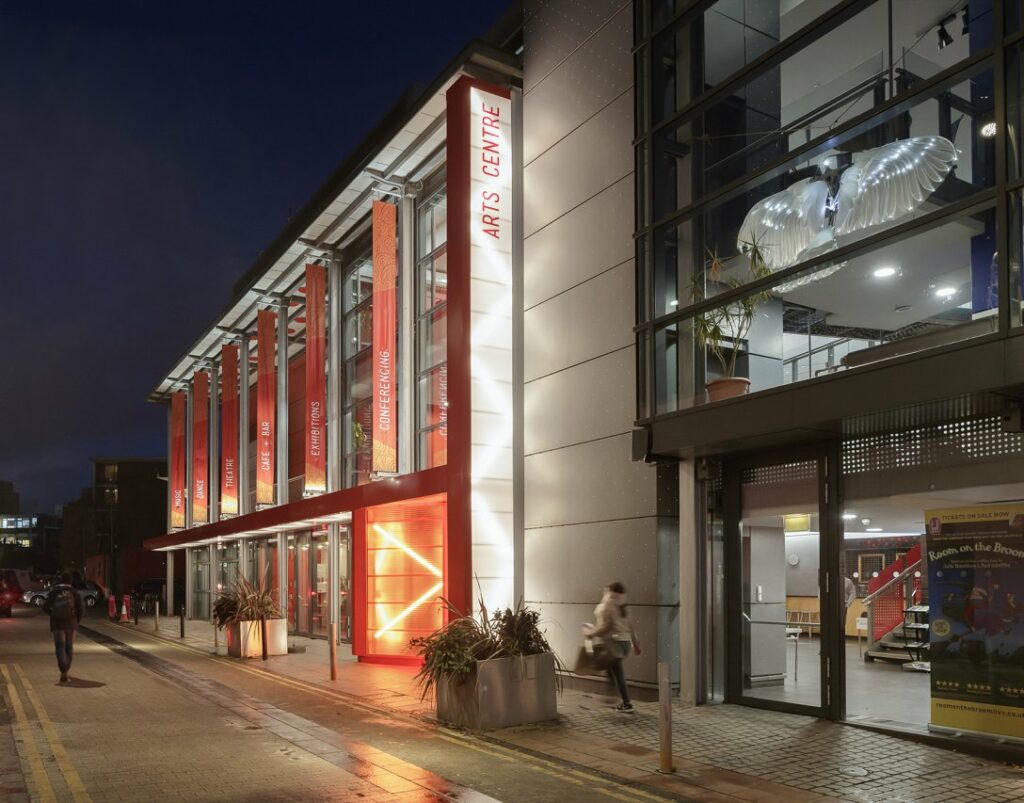 Night time external photo of the renovation of Stratford Circus, the East London arts venue.