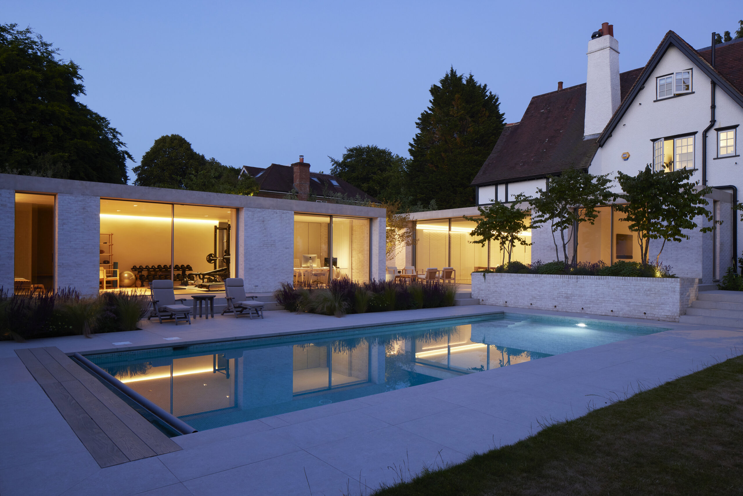 Dusk outside image of The Pines, a light filled, single-storey extension to a private 1900’s residential property