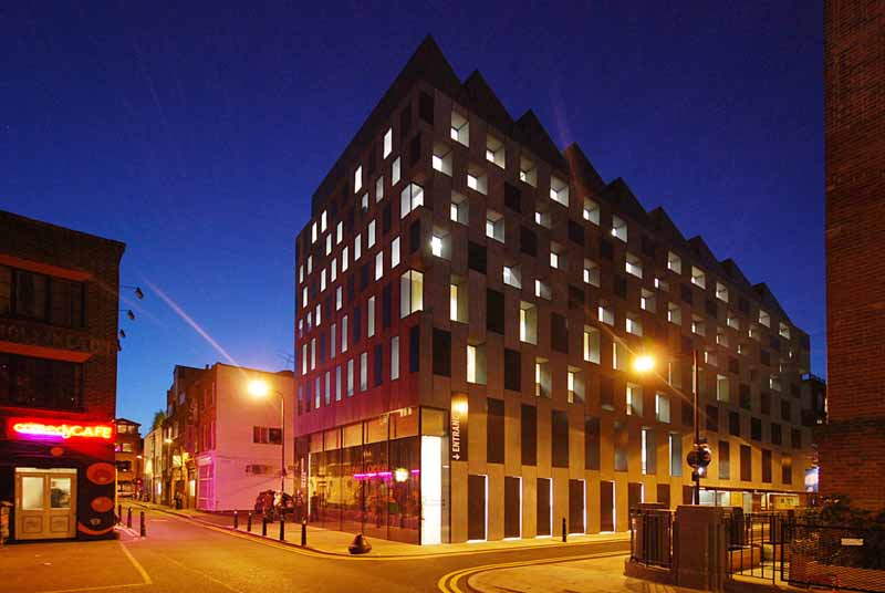 Nightime photo of the outside of Rivington Place, the first new publicly-funded dedicated arts building in London.